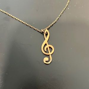 Treble clef necklace